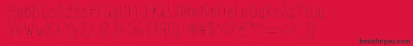 Thinnyness-Schriftart – Schwarze Schriften auf rotem Hintergrund