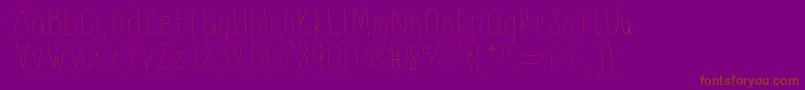 フォントThinnyness – 紫色の背景に茶色のフォント