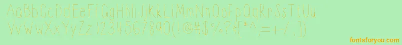 フォントThinnyness – オレンジの文字が緑の背景にあります。