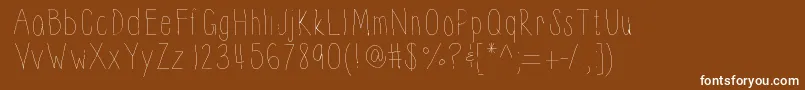Thinnyness-fontti – valkoiset fontit ruskealla taustalla