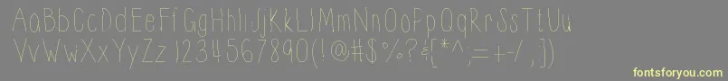 Шрифт Thinnyness – жёлтые шрифты на сером фоне