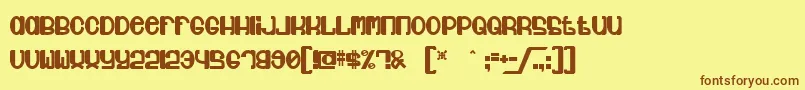 フォントJubie – 茶色の文字が黄色の背景にあります。