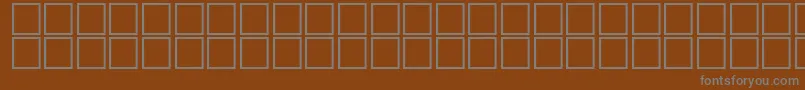 Шрифт AlMateen – серые шрифты на коричневом фоне
