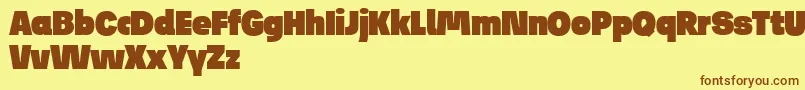 JosefReducedUltra Font – Brown Fonts on Yellow Background