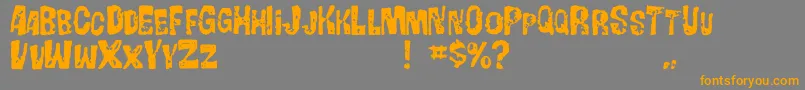 フォントGorgobold – オレンジの文字は灰色の背景にあります。