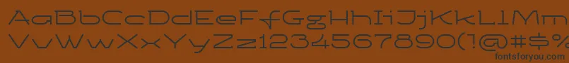 Ketosagc Font – Black Fonts on Brown Background