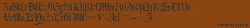 Ainsworthssk-Schriftart – Schwarze Schriften auf braunem Hintergrund