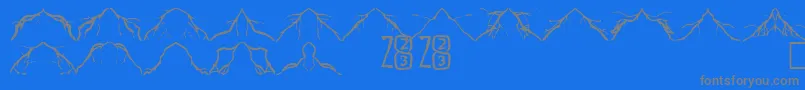 Czcionka Zone23Lightning – szare czcionki na niebieskim tle