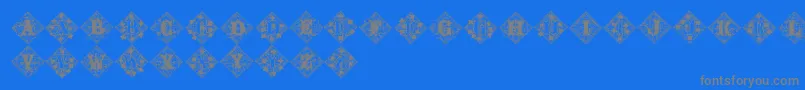 フォントJfivylacealt – 青い背景に灰色の文字