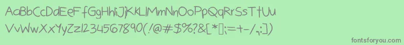 Bunnycookies Font – Gray Fonts on Green Background