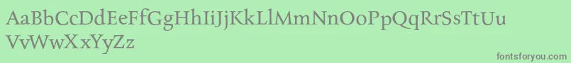 CharpentierrenredNormal-fontti – harmaat kirjasimet vihreällä taustalla