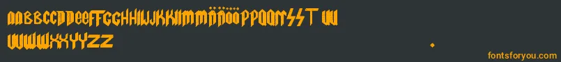 フォントSpinalT.Fanboy – 黒い背景にオレンジの文字