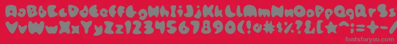 StoneskipMedium-Schriftart – Graue Schriften auf rotem Hintergrund
