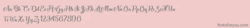 StardustAdventure-Schriftart – Graue Schriften auf rosa Hintergrund