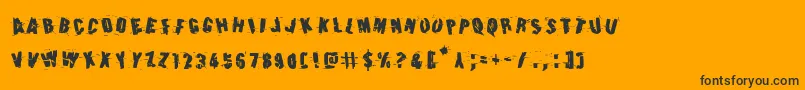 Earthshakerotate Font – Black Fonts on Orange Background