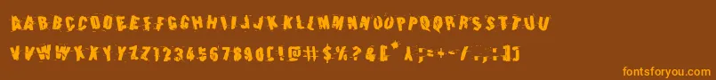 Earthshakerotate Font – Orange Fonts on Brown Background