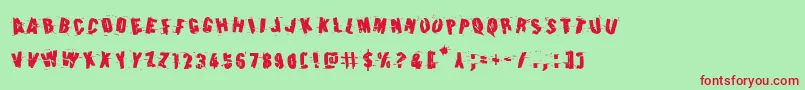 Earthshakerotate Font – Red Fonts on Green Background