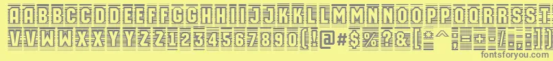 フォントAMachinaortocmln – 黄色の背景に灰色の文字