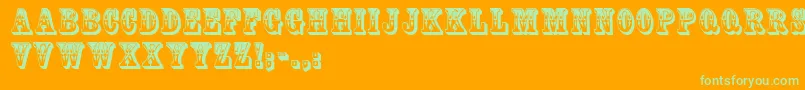 Mackinawdisplaycaps-Schriftart – Grüne Schriften auf orangefarbenem Hintergrund