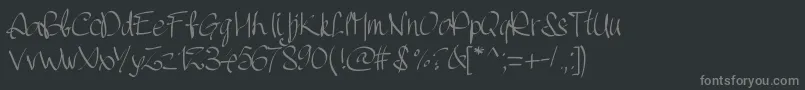 フォントPwhandscript – 黒い背景に灰色の文字