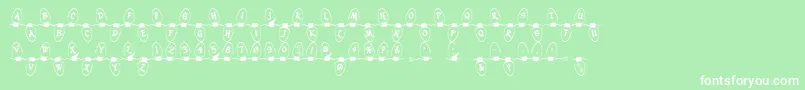 Christmaslightsoutdoor Font – White Fonts on Green Background