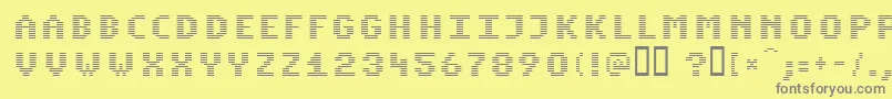 フォントKomodoreNormal – 黄色の背景に灰色の文字