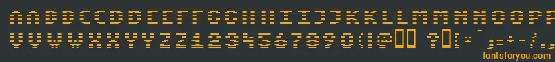 KomodoreNormal-fontti – oranssit fontit mustalla taustalla