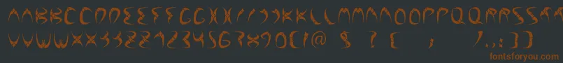 FuenteLilith Font – Brown Fonts on Black Background