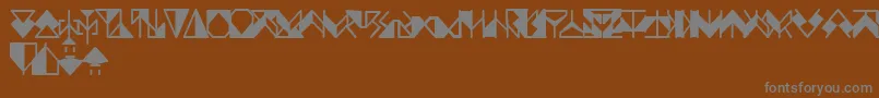 Ergonx-Schriftart – Graue Schriften auf braunem Hintergrund
