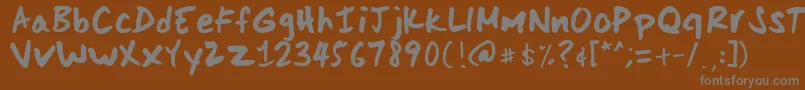 フォントScoderHand – 茶色の背景に灰色の文字