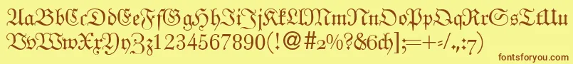 フォントUngeldbNormal – 茶色の文字が黄色の背景にあります。