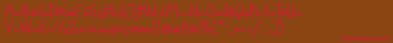 LinotypeinkyScript-Schriftart – Rote Schriften auf braunem Hintergrund