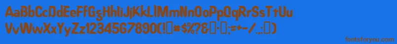 フォントOregondry – 茶色の文字が青い背景にあります。