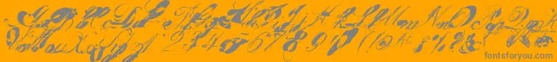 フォントGarglenutz.Fontvir.Us – オレンジの背景に灰色の文字