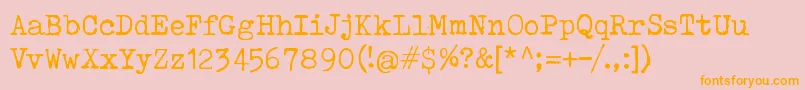 フォントToxTypewriter – オレンジの文字がピンクの背景にあります。