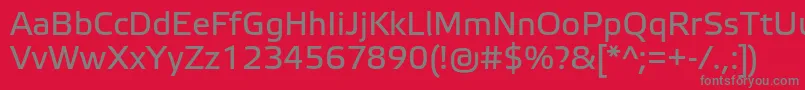 フォントElektraTextPro – 赤い背景に灰色の文字