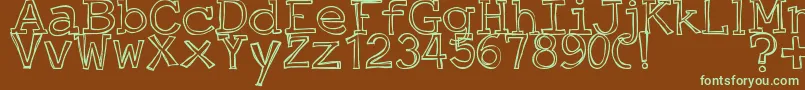JustAnOutty-fontti – vihreät fontit ruskealla taustalla
