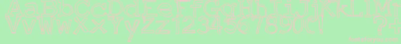 JustAnOutty Font – Pink Fonts on Green Background