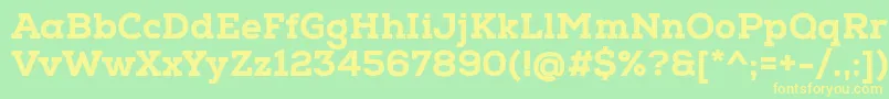 NexaSlabHeavy-fontti – keltaiset fontit vihreällä taustalla