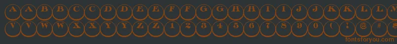 Czcionka Discoserifdn3DRegular – brązowe czcionki na czarnym tle