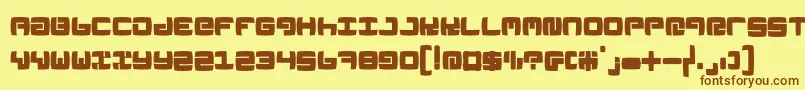 フォントLinoleumk – 茶色の文字が黄色の背景にあります。