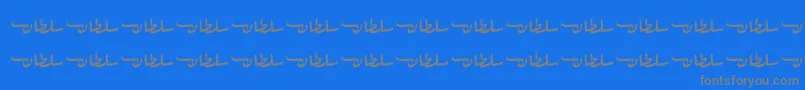 フォントSultanFree – 青い背景に灰色の文字