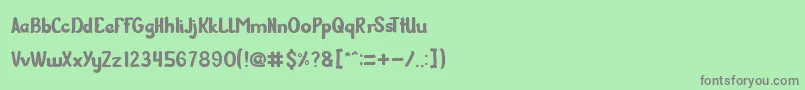 フォントGuitarOnStage – 緑の背景に灰色の文字