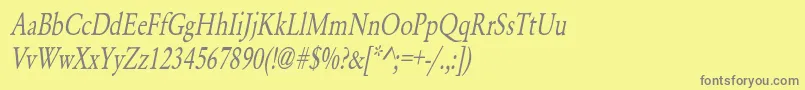 フォントYearlindNormalCondensedItalic – 黄色の背景に灰色の文字