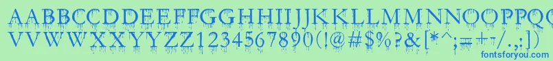 SfGushingMeadowSc Font – Blue Fonts on Green Background