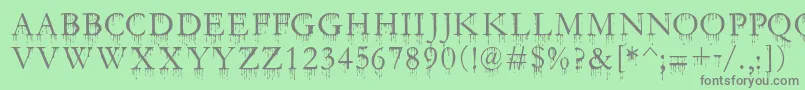 SfGushingMeadowSc Font – Gray Fonts on Green Background