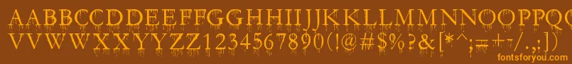SfGushingMeadowSc Font – Orange Fonts on Brown Background