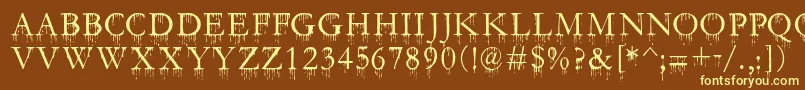 SfGushingMeadowSc-fontti – keltaiset fontit ruskealla taustalla