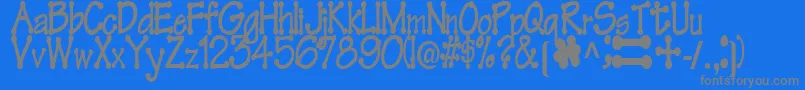 FeltRegularTtstd Font – Gray Fonts on Blue Background