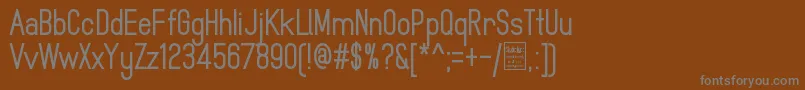 フォントMindblueBoldDemo – 茶色の背景に灰色の文字